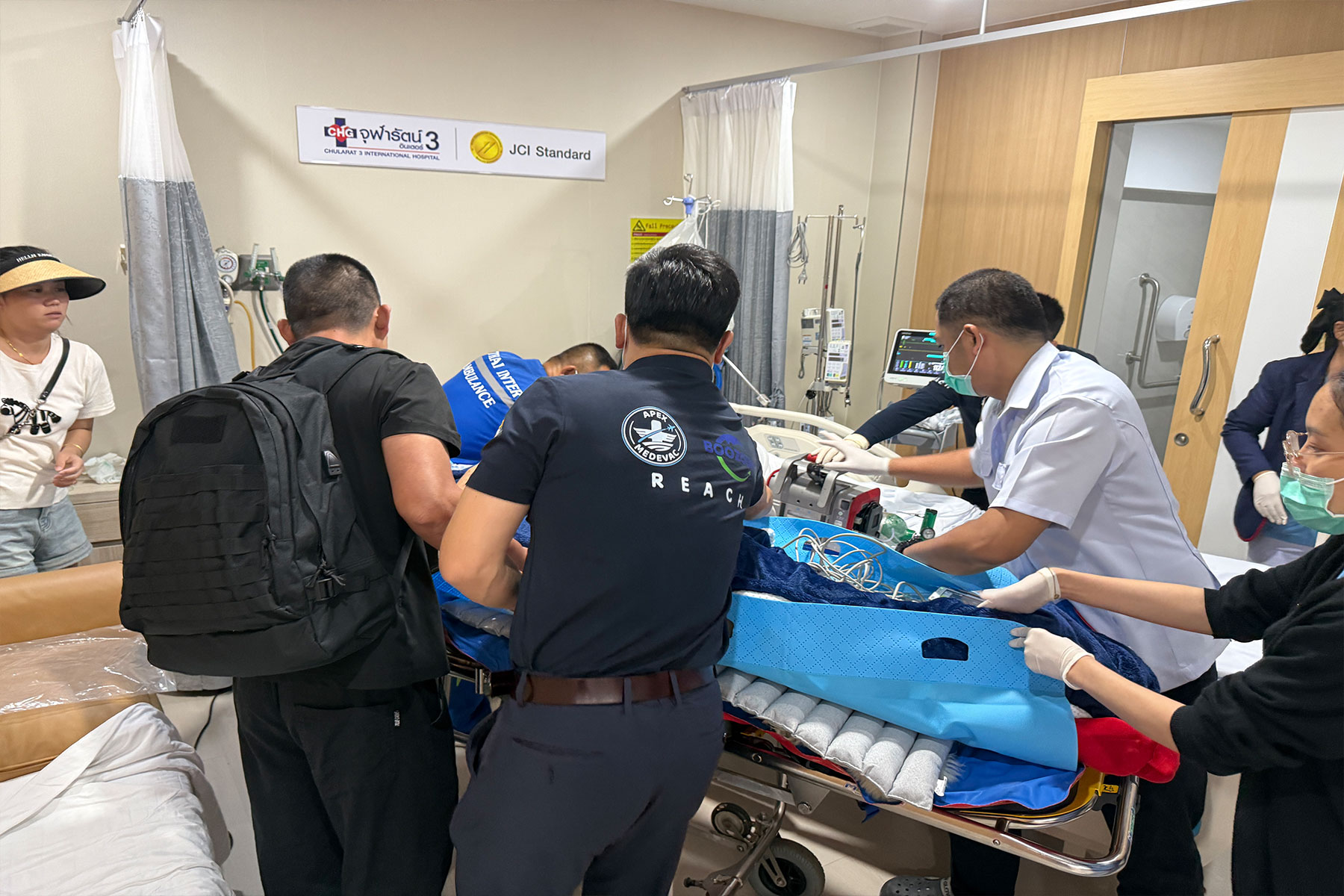 Medical team preparing the patient for air transfer